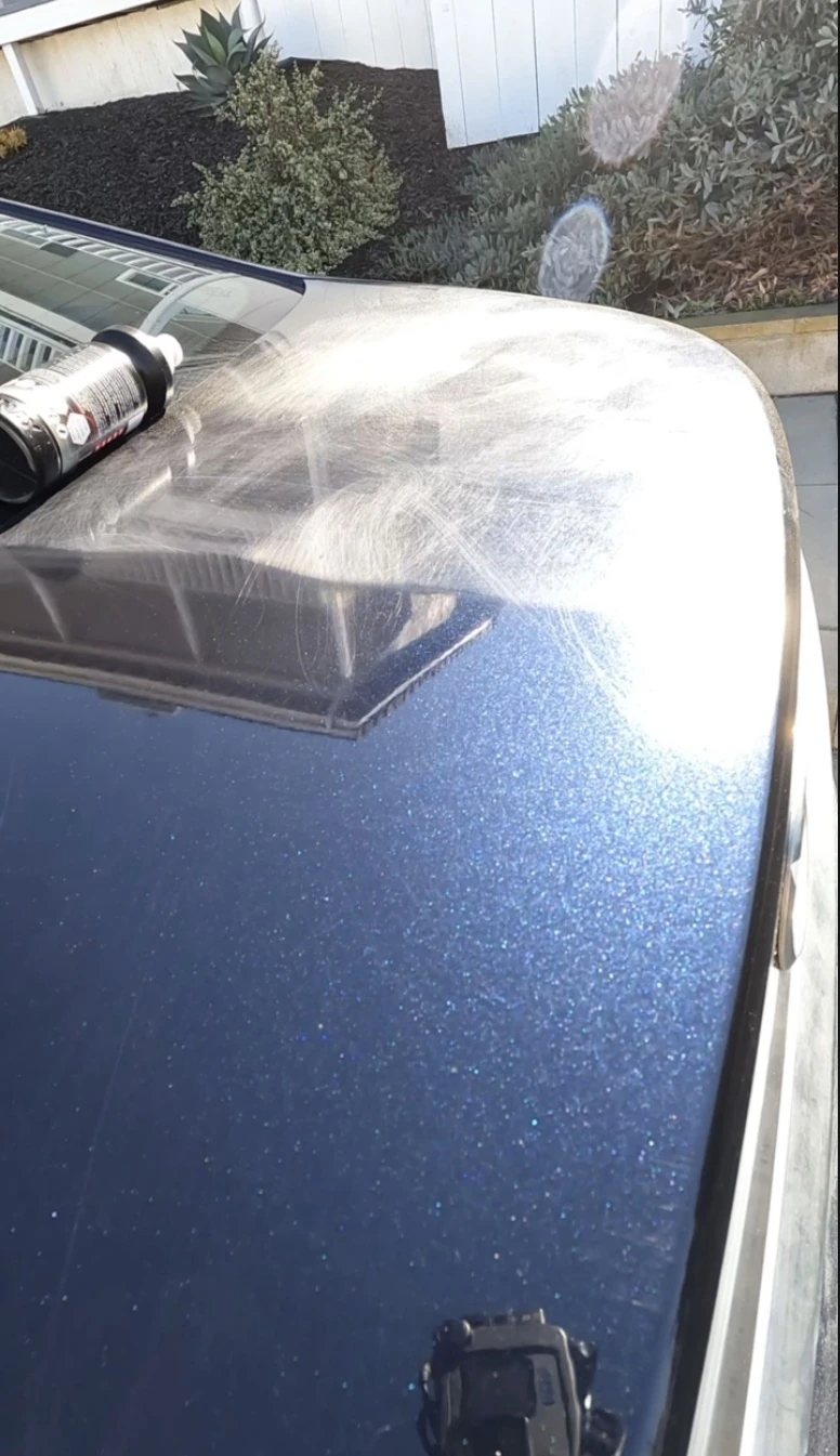 Close-up of metallic blue paint in direct sunlight